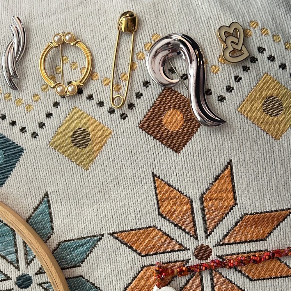 Assorted MONET Silver and Gold Brooch Pieces. 5 in collection.